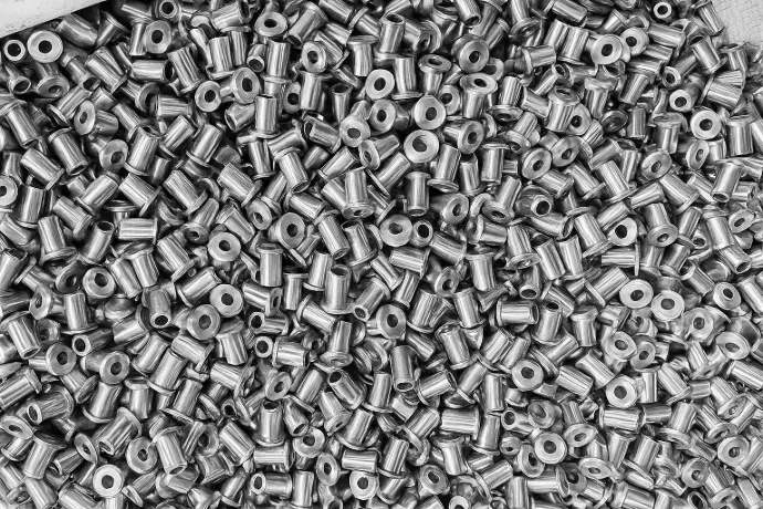 High-strength precision metal inserts for reinforcement in industrial assemblies.